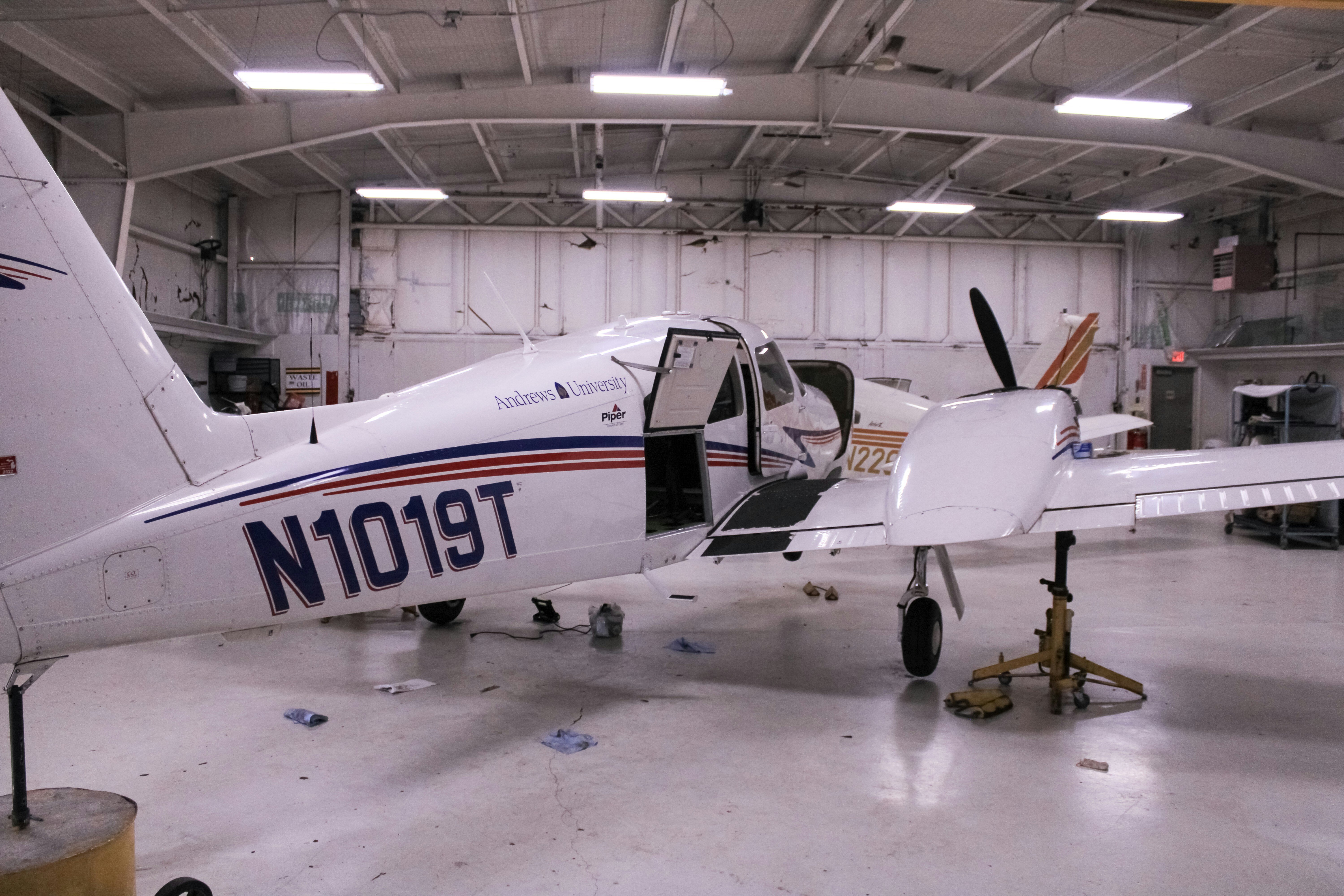 General aviation airplane parked in a hangar